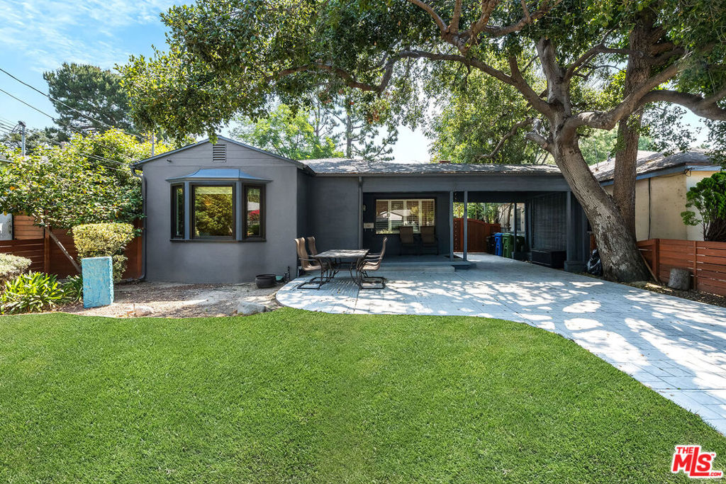 Welcome to 5310 Irvine Ave! Nestled on a quiet, tree-lined street in the heart of Valley Village, this picture-perfect property is brimming with warmth, character, and timeless appeal. The main house offers two spacious bedrooms, an office (counted as a third bedroom per title), and two bathrooms across 1,480 sq ft of beautifully maintained living space. Rich hardwood floors, abundant natural light, and vintage touches throughout create a cozy, inviting atmosphere that instantly feels like home. At the rear of the property, a detached one bedroom, one bathroom guest house/rec room of approximately 800 sq ft provides its own private entrance and endless possibilities ideal for visiting friends and family, a creative workspace, or potential rental income. Set on a 6,969 sq ft lot, the property offers ample space to relax, entertain, and enjoy the best of Southern California living, with charming outdoor areas and room to grow. Located within the highly sought-after Colfax Charter Elementary school boundaries, this is a rare opportunity to own a soulful and flexible property in one of the Valley's most desirable neighborhoods.*Guest house/rec room sq ft. partially permitted as a rec room. sq ft included in total sq ft. Guest/rec room may be grandfathered in, buyer to verify.*Fireplace is decorative only.