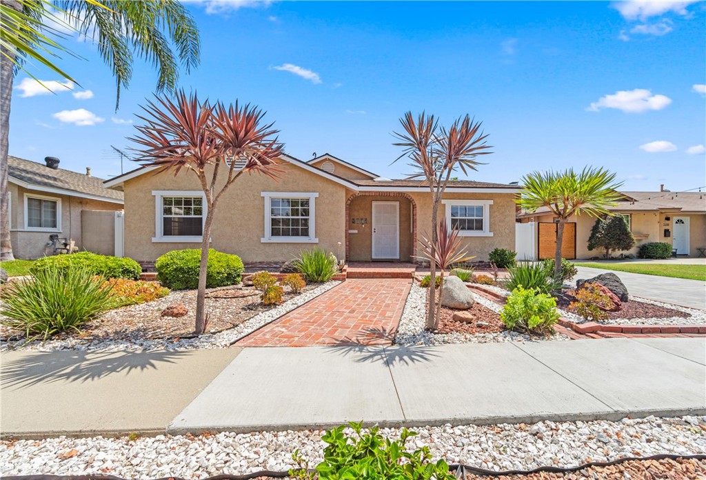 A diamond in the rough, you're going to appreciate the bones of this charming single story in the well established Plaza neighborhood with it's canopy of tree lined streets. Prime location, walk or bike to area restaurants, shops and entertainment, and a short distance to schools and freeway access. The property features a long driveway with room for an RV/boat/toy parking, a two car garage with additional, exterior storage surrounding the garage. Well maintained, low maintenance, eco friendly curb appeal, and hardscaped driveway. Inside you'll find beautiful brick accented archways, solid & sturdy bamboo and tile flooring. Open floorplan from living room into the family room with a cozy wood burning stove. Spacious master bedroom with 2 huge walk in closets, one fully insulated with cedar and a spacious bathroom with double vanity sinks. Spacious living with 3 bedrooms and 2.5 bathrooms. This home truly allows you to customize it to your dreams.