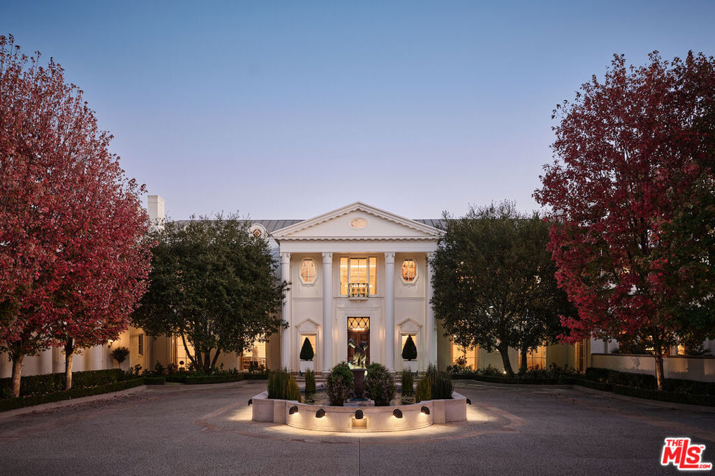 Casa Encantada, the most legendary estate in Los Angeles. Historic, iconic and timeless. Perched on an all usable 8.4-acre promontory overlooking the Bel Air Country Club. Built in 1937 by renowned architect, James E. Dolena, it's one of the most important examples of Los Angeles architecture. Meticulously restored by Peter Marino in the Deco Hollywood style of original interior designer - T.H. Robjohns Gibbons - every element has been thoughtfully considered. The scale and proportions are both grand and refined. The main residence features an elegant foyer with sweeping staircase leading to a grand entry hall with 14 ft ceilings. There is a spectacular formal dining room, jr. dining room, walnut paneled library, formal living room, and an informal living room with Art Deco lucite bar. All feature intricate period moldings, high ceilings, steel windows and abundance of natural light. Upstairs is equally detailed with a significant primary suite, featuring 2 sitting rooms, large main bedroom, double marble baths and closets. An additional 3 bedrooms provide for family or guests. An incredible pool pavilion, perfect for hosting large scale events, doubles as a professional movie/screening room. Irreplaceable and incredible landscape design by Benjamin Purdy. The grounds feature a tiled 60 ft pool, formal rose gardens, vegetable/herb garden, tropical botanical garden, N/S tennis court with viewing pavilion, sports court, and vast grass lawns. A full-sized paved road encircles the entirety of the property. Built to be the most important estate in the country, maintained and stewarded until today. A once in a lifetime opportunity to acquire a legend.