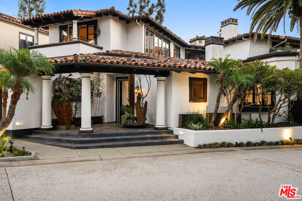 One of only two custom residences in the prestigious Century Woods community not built by the original developer, this remarkable estate offers a truly unique opportunity. Designed as an authentic villa, it spans 5,046 square feet and features 3 spacious primary bedrooms and 3.5 beautifully appointed bathrooms. The thoughtful floor plan combines openness with livable intimacy, creating spaces that are both elegant and inviting.Every detail of the home has been carefully crafted. A harmonious palette of limestone, granite, and rich hardwoods sets the tone, complemented by skylights, soaring ceilings, and meticulous cabinetry that highlight exceptional craftsmanship. The result is a muted yet refined sophisticationtimeless finishes that speak to quality while allowing natural textures and tones to take center stage.Sunlight pours in through expansive windows and skylights, filling the interiors with warmth and vitality. The seamless integration of light, air, and landscape blurs the line between indoors and outdoors, reinforcing the villa's Mediterranean style. Distinct architectural touches and elegant proportions lend a sense of grandeur, while the careful use of materials ensures comfort and livability throughout.More than a residence, this home is a masterful blend of authenticity and elegance offering the charm of a European villa, the grace of fine craftsmanship, and the rare distinction of being a custom-built estate within one of Los Angeles' most exclusive communities.