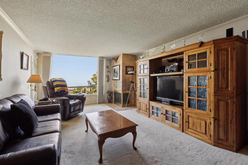 Wake up every day to an unforgettable panorama. This 3-bedroom, 2-bath condominium pairs the comfort of home with a view that has no equal. From sunrise coffee to sunsets, the living and dining areas flow seamlessly to a private patio where the Bay stretches out before you. Inside, warm wood cabinetry and a cozy fireplace give the home an inviting touch, perfect for both quiet nights in and hosting friends. Located in the coveted Mills Estates community, this home offers more than just a place to live. Step outside and you're minutes from Highway 280, Sawyer Trail, and the best of Millbrae's parks, shops, and dining. The community pool, HBO cable, and internet included in the HOA add another layer of ease. For those who value convenience but don't want to sacrifice beauty, this is a rare opportunity to have both and right where you want to be, with a view you'll never forget.