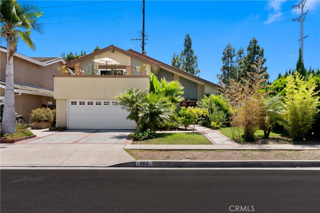 Welcome to 622 W Alpine Ave, a spacious home in one of Santa Ana’s most inviting neighborhoods. This property is full of thoughtful updates and features that make it stand out. As you step inside, you’ll notice the fresh paint downstairs that brightens the space and gives it a clean, move-in-ready feel. The first floor offers plenty of room to spread out with two living rooms and a dining room, along with a full bedroom and bathroom, perfect for guests, multi-generational living, or a private home office.
Upstairs, the primary suite is a true retreat with vaulted ceilings that add light and volume to the space, along with an en-suite bathroom. You’ll love stepping out onto the private balcony, which has been recently updated with brand-new tile, ideal for enjoying your morning coffee or evening breeze. Down the hall, you'll find the other 3 bedrooms and a full bathroom. All 3 bedrooms feature natural lighting and great space.
Outside, the backyard is built for relaxation and fun, featuring a private pool and spa that’s perfect for entertaining family and friends. Beyond the home itself, the neighborhood offers even more to enjoy. Just around the corner is Lillie King Park, a huge community park with playgrounds, open green space, and walking trails. In the front yard you'll find multiple fruit trees, including blood orange, pear, lemon, and Persimmon.
This home combines comfort, convenience, and lifestyle all in one. Don’t miss the chance to make it yours.