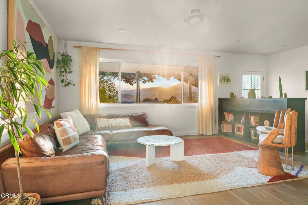 Welcome to 80 Watkins Way, a beautifully curated residence in the heart of Ojai that offers the best of California indoor-outdoor living. This 3-bedroom, 2-bathroom home is designed for comfort, wellness, and connection ~ all set against the backdrop of Ojai's famous 'pink moment' sunsets. The open floor plan seamlessly connects the main living and dining areas to the outdoors, creating a light-filled space perfect for entertaining or relaxed family living. Step outside into your private oasis where established succulent gardens surround a cedar hot tub and infrared sauna, offering a truly restorative retreat at home. Mature plantings and thoughtfully designed landscaping evoke a sense of peace and timelessness, while a central courtyard and expansive yard provide space for children to play freely complete with a trampoline and a charming chicken coop for fresh eggs each morning. Inside, the primary bedroom is a tranquil escape with direct access to the garden, while two additional bedrooms are ideally suited for children, guests, or creative workspace. The oversized two-car garage offers ample room for vehicles, storage, or workshop potential, making this home as practical as it is picturesque. Located in a quiet, sought-after Ojai neighborhood, this property invites you to settle into a slower pace and enjoy life's simple pleasures from garden-to-table living to warm evenings spent under the stars. Whether you're gathering with family, hosting friends, or simply soaking in the sunset views, this property delivers a lifestyle that feels both elevated and grounded in nature.