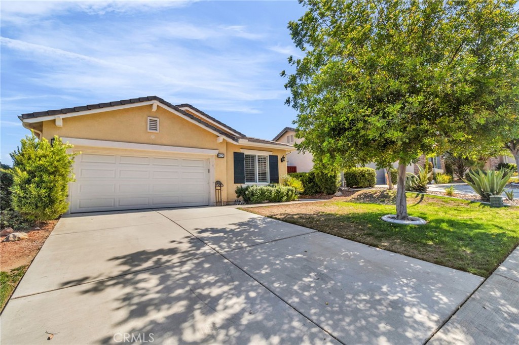 Discover the epitome of luxurious adult living in the prestigious, 55+ community of the Four Seasons Resort in Hemet. This stunning residence perfectly combines elegance, comfort, and sophistication within a secure, guard-gated golf community. Built in 2008, this beautifully maintained home features two spacious bedrooms and two bathrooms—designed for both relaxation and entertaining. Step inside to find an inviting and spacious family room that flows seamlessly into a large, cozy living area with a charming fireplace, ideal for gatherings with friends and family. The gourmet kitchen is a chef’s delight, equipped with an expansive center island offering generous storage, stylish granite countertops, and ample cabinetry. An adjacent bar area makes entertaining effortless while offering views of your private backyard.The primary suite serves as a tranquil retreat, complemented by a light and bright primary bathroom with a versatile space that can be easily adapted to your needs. The home also features a separate laundry room, vaulted ceilings that enhance the sense of space, and an attached two-car garage for convenience. Outside, the serene backyard provides an ideal setting for outdoor activities, gardening, or simply unwinding under the California sun with friends and family. This exquisite residence offers the perfect harmony of comfort, style, and prime location within this exclusive gated golf community. Enjoy a wealth of community amenities including a sparkling pool, relaxing spa, The Lodge Clubhouse and Bistro Restaurant, billiard and game rooms, a computer room, theater, gym, tennis courts, shuffleboard, pickleball courts, and more! The community boasts a remarkable 10-acre recreational center, featuring a large private Lodge with a full social calendar of events and activities—truly a vibrant and engaging lifestyle in Hemet. Though the tax sheet indicates three bedrooms, the current setup includes two generously sized bedrooms only.