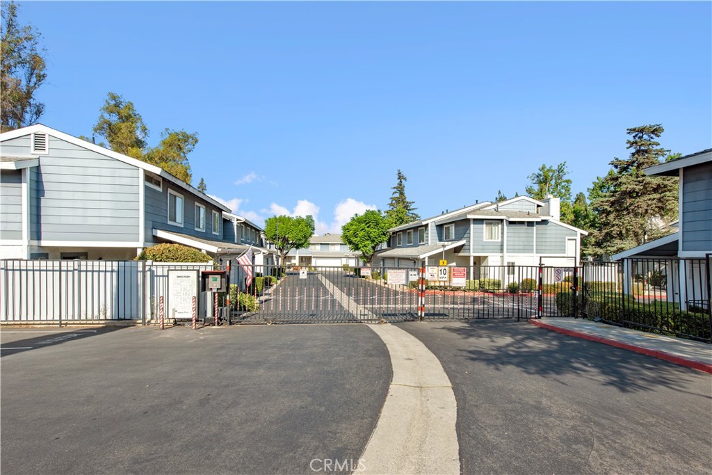 Desirable Single-level condo located Solana Park with subterranean parking down below in the gated garage. Feature 2 bedrooms & 2 baths, approx. 1126 sq. ft., built in 1984. Spacious living room with cozy fireplace and access to the balcony. Individual laundry room adjacent to kitchen with cabinetry, appliances, and breakfast area. Open Floor Plan. Laminate floor in the living room and all the bedrooms. Master bedroom with a huge closet, shower, and one sink vanity. Another bedroom with one sink vanity and tub. New interior paint. Central A/C unit. Quiet Neighborhood. Walking distance to Tokyo Central and Shopping Center. Community Pool & SPA & Basketball Court. Close to Market, Restaurants, Bus Stop, Post Office, Big League Baseball Field, Fitness, Home Depot, Golf course, Park, and Target. Easy access to freeway 10 & 60 and walking distance to Shopping Center.