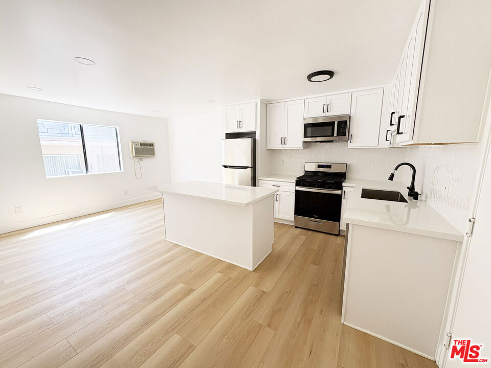 FULLY RENOVATED 1 Bedroom, 1 Bathroom Apartment with tons of light. Gated parking/ secure building. Large apartment with the a spacious bedroom - fully renovated kitchen, quartz countertops and stainless appliances. Massive kitchen island with a quartz countertop. Apartment complex has undergone extensive renovations. Very bright, lots of windows. Excellent Hollywood location near Silver Lake, Los Feliz, West Hollywood, Koreatown, the 101 for easy access to Downtown LA and more. ** One Month Free - advertised rent is the blended average of the first year with one month free**