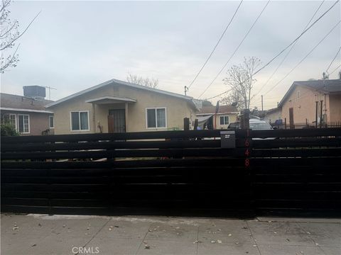 Photo of 1648 E 110th St, Los Angeles, CA 90059 (MLS # DW26033538)