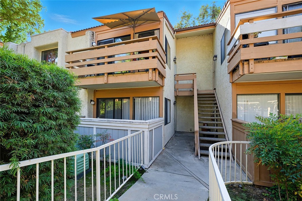 WELCOME TO THIS ABSOLUTELY BEAUTIFULLY UPGRADED CONDO located in a highly desirable Diamond Bar security-gated community with 24-hour guard service and an onsite manager! Residents enjoy resort-style amenities including sparkling pools and spas, tennis courts, and a clubhouse.  Across from the popular Diamond Bar Golf course, there is also convenient access to nearby Peterson Park and Sycamore Park and all with easy access to both the 60 and 57 freeways!
 
This lower-level, single-story unit features fresh paint and new blinds, very high-grade wood-grain tile flooring throughout, a remodeled kitchen with sleek shaker cabinets, granite countertops, brand-new stainless-steel stove and dishwasher, microwave, and a newer side by side stainless steel refrigerator! The spacious laundry room includes a full-size washer and dryer for your convenience.  Additional updates include a new central A/C, new water heater, new garbage disposal, recessed lighting and more!
 
Step outside to your own patio, perfect for relaxing or entertaining. Rare that these units have such close parking, but we do! Remarkably close location of two assigned parking spaces—one a covered carport.  Water and trash are also included, making this an easy place to call home.