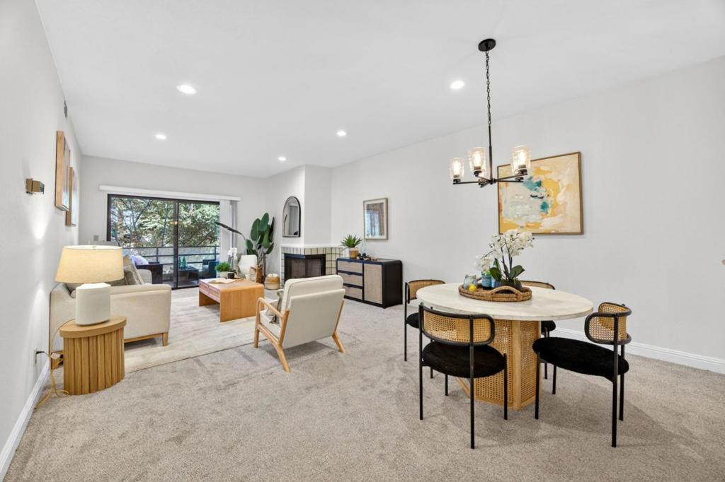 Welcome to this beautiful 2-bedroom, 2-bathroom condo in a highly desirable gated community, facing a tranquil courtyard with a soothing water fountain. This ground-level unit boasts a spacious open-concept layout that seamlessly blends comfort and style, enhanced by fresh paint throughout. The kitchen features granite countertops, while both bathrooms have been tastefully renovated. The generous primary suite offers a dual-sink vanity and a large walk-in closet. Enjoy the private patio tucked behind mature treesperfect for relaxing or entertainingplus the convenience of in-unit laundry and two assigned covered garage spaces with elevator access, a rare find in the area. Central A/C and heating ensure year-round comfort, and water and garbage are included in the HOA fee for added ease.Community amenities include a pool, fitness center, and secure entry. Ideally located just minutes from Apple, Santana Row, downtown Cupertino, and major highways (280, 85, 101), and served by top-rated Cupertino schools. A rare opportunity not to be missed!