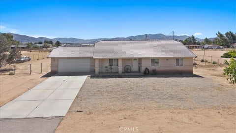 Photo of 15535 Erie Road, Apple Valley, CA 92307 (MLS # CV26145160)