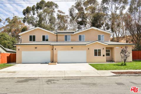 Photo of 5517 - 5519 Lavinia Avenue, Lynwood, CA 90262 (MLS # 26863227)