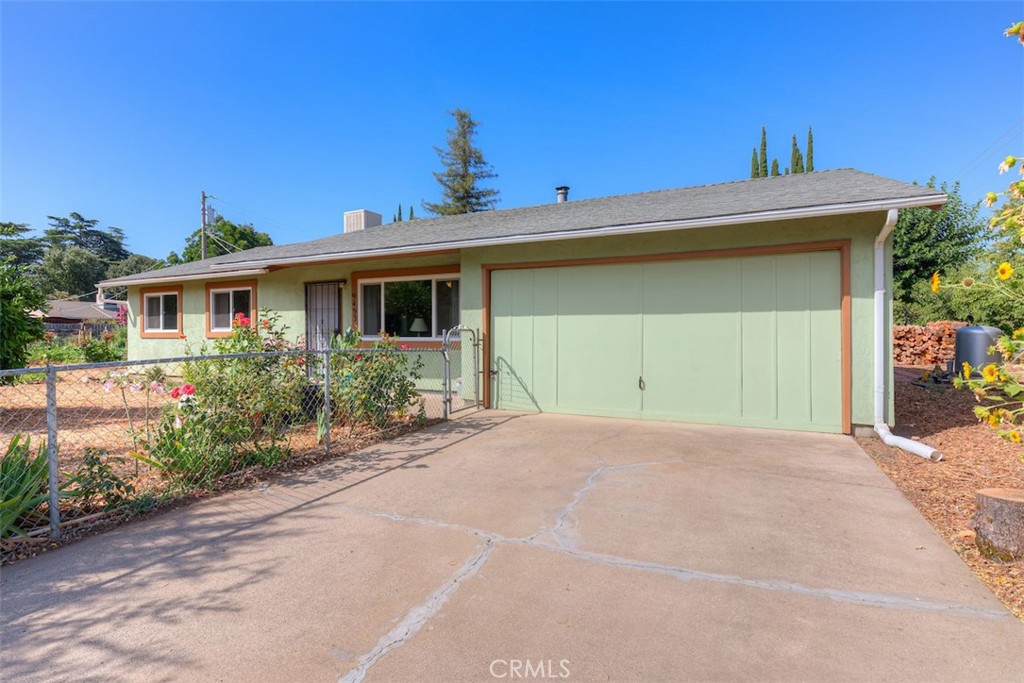 Escape the hustle and bustle and settle into this cozy Dayton home, only 5 miles from Chico and in the Durham school district. Gardeners rejoice! The fully fenced property has a variety of grapes, nectarines, apricots, peaches, persimmons, pomegranates, lilacs, Meyers lemon, mandarin, lime, flowers, and raised garden beds right next to an 8x8 garden shed. Walk into the house and warm yourself next to the Lopi wood stove while you notice all the upgrades: Newer vinyl plank floors throughout the house, Milgard windows, farmhouse sink, newer master shower, recent paint, and water heater. The exterior is all stucco, and the trim is recently painted. The roof is only eight years old, and the well has a newer pump with upgraded electrical. A new 1500-gallon septic tank has been installed. This home expresses pride of ownership from long-time owners. Houses in Dayton don't come up often, so see it today!