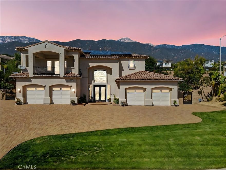 Welcome to 9612 Enclave Drive, an extraordinary Toll Brothers estate tucked away in a peaceful corner lot within the prestigious Alta Loma community of Rancho Cucamonga. Part of the exclusive Carlsbad Series, this residence embodies luxury, craftsmanship, and California living at its finest.



Spanning 4,671 square feet of meticulously designed space on a half-acre lot, this home features 5 spacious bedrooms plus a den/ office and 5.5 bathrooms, each bedroom with its own private en-suite. 3 fireplaces located in the formal living room, family room, and the primary suite. Step through the grand double doors into a dramatic two-story foyer with soaring 30-foot ceilings and an elegant dual circular staircase that sets the tone for the grandeur within.



The gourmet kitchen is a chef’s dream, featuring a large granite island, high-end stainless steel appliances—including dual ovens and a 6-burner cooktop—a walk-in pantry, butler’s pantry with wine chiller, and a charming breakfast nook that opens to the family room.



The luxurious primary suite serves as a private retreat with a spacious sitting area, custom built-ins, and a spa-inspired bathroom offering a Roman tub, dual-head walk-in shower, and dual water closets. Upstairs, enjoy two private balconies with breathtaking mountain and city-light views.



Outside, your private resort oasis awaits. The heated pool and spa invite year-round enjoyment, complemented by inviting lounge areas ideal for entertaining or unwinding. The beautifully landscaped backyard features drought-tolerant greenery, towering palms, and a bountiful collection of fruit trees including longan, pomelo, mango, kumquat, orange, and both soft and crunchy persimmon—creating a serene and abundant garden setting.



Additional highlights include a main-level mother-in-law suite, library/office, and a spacious laundry room with sink. Custom drapes and blinds accent the home throughout formal living room and dining room and a paid off solar agreement. Situated in an equestrian-friendly community with direct access to horse trails, this estate offers the perfect blend of privacy, elegance, and outdoor lifestyle.



With no HOA, no Mello-Roos, and a low tax rate, 9612 Enclave Drive represents a rare opportunity to own a true Rancho Cucamonga gem—where grandeur meets functionality, and nature meets luxury.