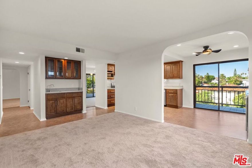 Welcome to this spacious 2 Bed/ 2 Bath condo with 1,750 sqft of living space nestled in the highly desirable Vista Del Oro neighborhood of San Pedro! Enjoy breathtaking views of the Palos Verdes hills, Vincent Thomas Bridge, and LA Harbor right from your private balcony. Step inside to an inviting  layout with an expansive living area that opens to your private balcony with views and featuring, Built-in wet bar, custom cabinetry and a beautiful fireplace! The upgraded kitchen offers modern finishes and ample counter space perfect for everyday living or entertaining guests. Beautiful dining area with views and separate Family room included which walks into the breakfast area and a second balcony! The expansive primary suite includes a large double sized closet, En-suite bath, new carpet and recessed lights. Second bedroom is also spacious with ample amount of closet space, new carpet and recessed lights. Additional highlights include in-unit laundry for convenience, central A/C and heat, new paint throughout, and new carpet in the bedrooms. Enjoy the coastal breeze from your oversized balcony ideal for morning coffee or evening sunsets. This unit includes 2 side by side gated parking with overhead storage space! Community Rec room includes Billiard, sauna, and kitchen, perfect to host a small gathering!  Situated on a quiet street, this condo offers the best of both convenience and tranquility. Walking distance to Averill Park, downtown San Pedro, LA Harbor, Shopping and dining, and just minutes to freeway access for easy commuting. Don't miss the opportunity to own this stylish and spacious home in one of San Pedro's most sought-after communities!