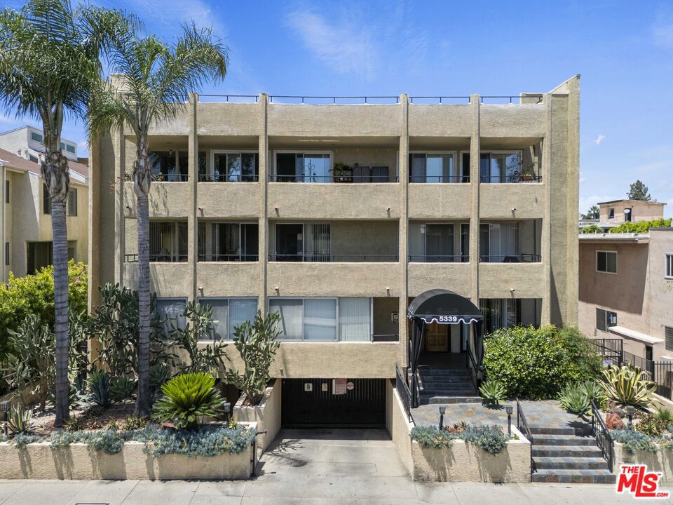 Prime Encino located a 2BR/2BA, well-located, 2nd floor move-in ready condo just north of Ventura Blvd. This unit features hardwood floors throughout and recessed lighting for a clean, modern feel. The functional layout features a dedicated dining area, a wet bar for entertaining, and a bonus den that is ideal for a home office or a cozy reading space. Both bedrooms are well-proportioned, and the primary suite includes an en-suite bath. Enjoy access to a community swimming pool for warm SoCal days. Includes two side-by-side parking spaces in a gated underground garage. With close proximity to major highways, shopping, and dining, this is a smart and affordable way to step into homeownership in a desirable location.