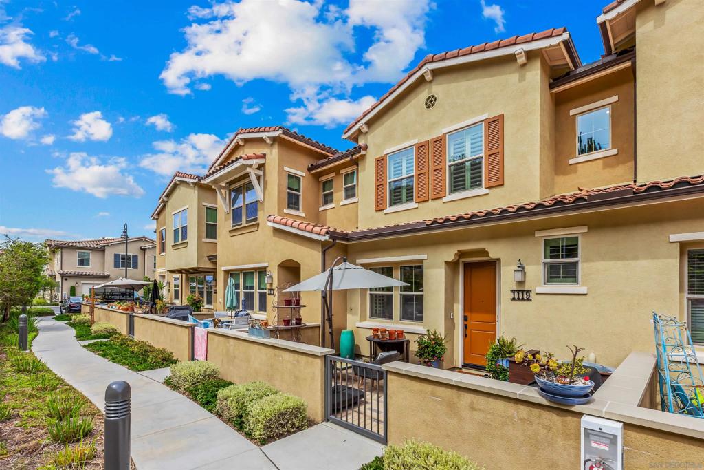 Your Vista dream townhome is here! This stunning 3-bedroom, 2.5-bath residence is fully upgraded, turnkey, and move-in ready. Grab your favorite beverage to enjoy on the front patio while listening to the soothing sounds of the relaxing fountain and soak in the breathtaking mountain views. This location enjoys the best weather in San Diego. It stays cool when it’s hot in other areas and clear skies are enjoyed while other areas of the county are covered by clouds. The chef’s kitchen is a true showstopper—perfect for hosting dinner parties or casual gatherings. The open floor plan makes entertaining effortless, with plenty of room for “just one more guest.” A leased solar system will help maximize your energy efficiency. When it’s time for fun in the sun, the community pool is only feet away, ready for all your summer splashes. Convenience is unmatched—grocery stores, schools, movie theaters, restaurants, and Starbucks are all just around the corner. And while you may not need a car in this location, the spacious attached two-car garage has you covered. Built in 2020, this modern townhome offers sleek finishes, abundant space, and undeniable style. Don’t miss your chance to claim the keys and start your next chapter in beautiful Vista!