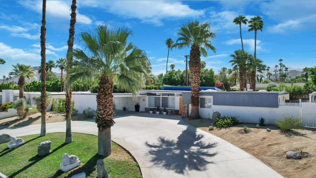 This MID CENTURY POST AND BEAM is ready to be taken to the next level. The property features a new foam roof, resurfaced pool with pebble finish, and new HVACs. Additionally, there is a new awning, resurfaced pool decking and new variable speed pool pump. There is a wonderful sense of arrival with floor to ceilings windows providing a spectacular view of the outdoors. Inside you'll find redone concrete floors with gray overlay, new kitchen appliances and 22' of counter space to display all incredible treats for your guests. Imagine outdoor entertaining - there's a large 18x36 pool, covered patio with misting, a pool deck with plenty of space for recliners, jacuzzi or firepit and a natural gas hookup for grilling. The private oversized lot leaves many possibilities to make your own special retreat. Location, Location, Location - the El Paseo shopping and restaurants are close by. South Palm Desert is still the most desirable neighborhoods in Palm Desert.