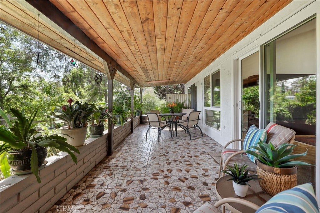 Photo of 3503 Bahia Blanca W #C, Laguna Woods, CA 92637 (MLS # OC26195449)