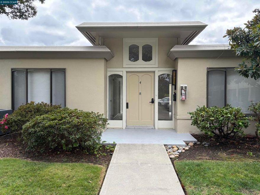 Welcome to Rossmoor, a premiere residential community for the active seniors. Level in, no steps to upgraded end unit, 2bed/1bath with stall shower, full size washer and dryer. Two glass sliding doors provide access to the spacious atrium with ample room for outdoor relaxing and dining, filters in offers day light to dining room, kitchen and primary bedroom. Carport is conveniently located steps away with storage closet. Stainless steel refrigerator and glass top electric range in kitchen with a built-in desk for menu planning. Location is near the Gateway and Hillside Clubhouses for a range of amenities, sports and club meetings. The community provides a fitness center, pools, tennis, pickleball, bus transportation, golf with extra fees.