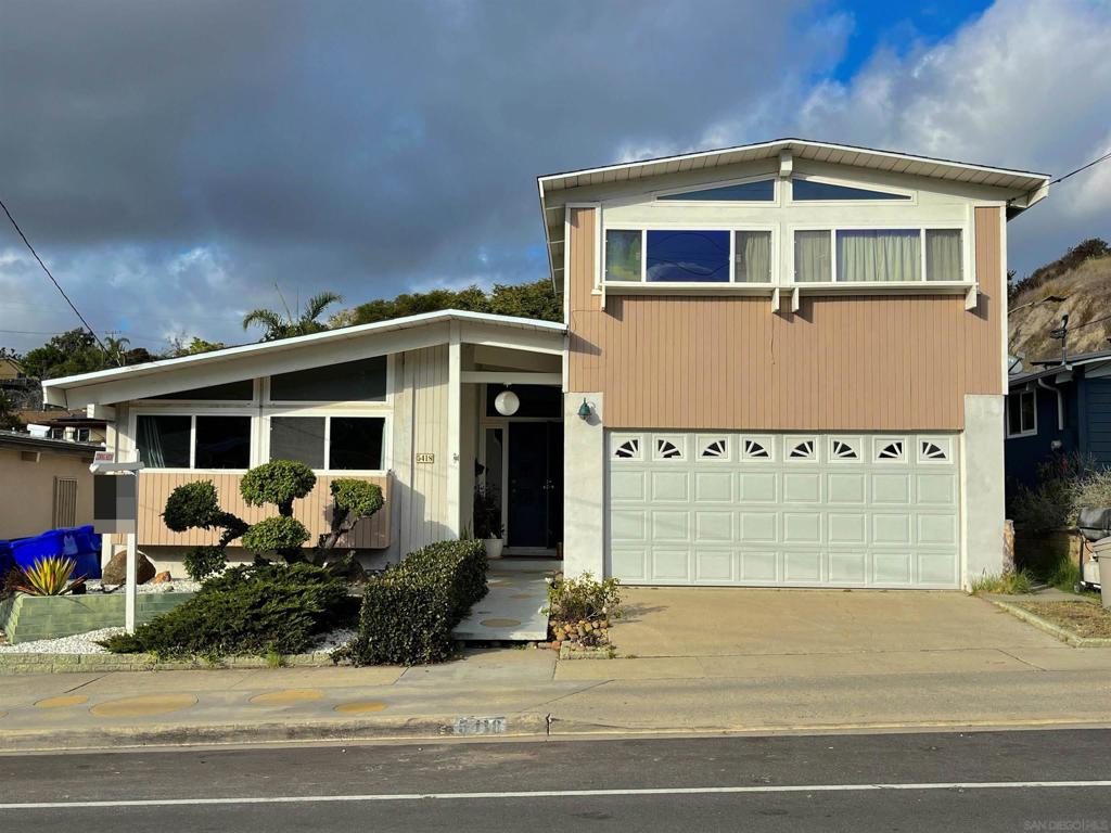 Nestled in proximity to SDSU, this 4-bed, 2.5-bath gem is an exceptional residence. Two master suites add versatility, while newer wood floors and spacious bedrooms define the open floor plan. The renovated kitchen, highlighted by top of the line stainless steel appliances, vaulted ceilings, is a contemporary masterpiece. Two large living areas offer flexibility for relaxation and entertainment. Venture outdoors to a sizable secluded backyard with mature fruit trees, creating a peaceful retreat. The Trex deck off the master suite elevates outdoor living. With its strategic location, modern upgrades, and timeless features, this property is a unique blend of convenience and charm, promising a distinctive living experience. Whether considering an investment opportunity or a place to call home, this residence captures the essence of Southern California living at its finest.
