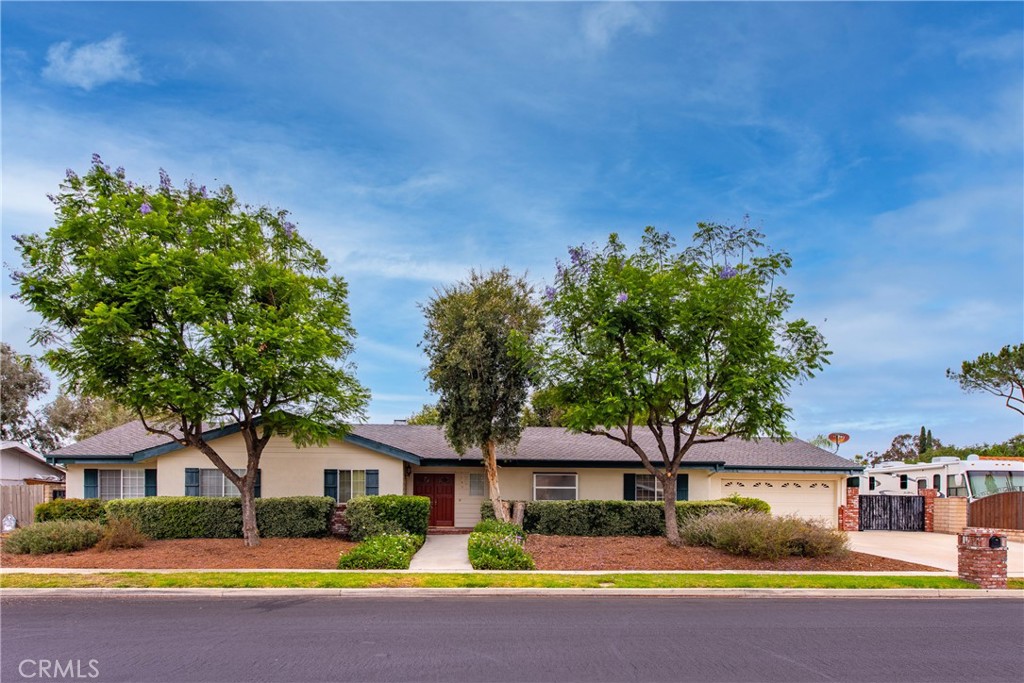 This isn’t your typical Thousand Oaks ranch! Built in 1995, a rare find in this neighborhood.. This thoughtfully designed home with nearly 2500SqFt blends volume, light, and function in a way that just feels right from the moment you walk in.
Step inside, and you're greeted by vaulted ceilings and an open-concept layout that offers breathing room in all the right places. The kitchen? It’s massive. With a layout perfect for entertaining, this is where people gather, stories are shared, and meals become memories.
Currently configured as three spacious bedrooms (can easily be a 4 bedroom), each space feels intentional, especially the primary suite, which offers a huge en-suite, a generous walk-in closet, and just the right amount of calm and privacy.
Outside, you’ll discover what truly sets this property apart: an expansive backyard oasis with no neighbors behind, a sparkling pool, and plenty of space to host, unwind, or simply float the day away. There’s even gated RV access and a separate workshop attached to the garage, perfect for hobbyists, creatives, or those needing extra storage.
This is more than just a house. It’s a rare opportunity to own something unique with modern construction, flexible space, and potential to make it your own with your favorite flooring and color palette. This home stands out from the crowd, don’t miss this unique home.