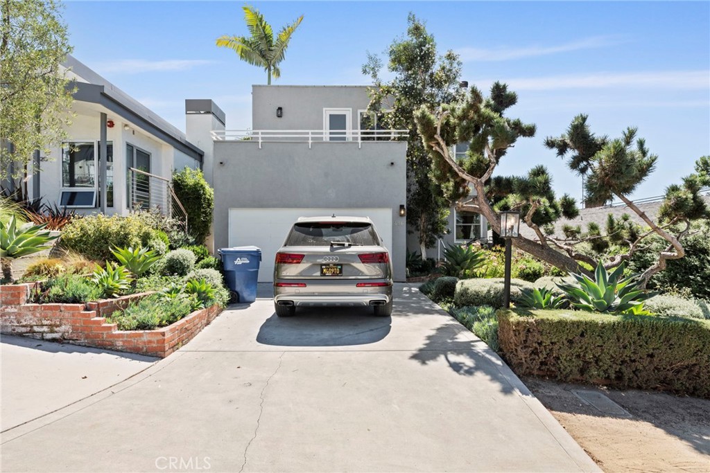 Welcome to a rare find in the coveted Hermosa Beach Valley - a turnkey, recently updated 4 bedroom home. As locals know, this prime North Hermosa cul-de-sac location is hard to beat: just 2 houses up from the greenbelt, and an easy walk to the beach, to both Hermosa elementary schools and to Valley Park. The 1st floor living area of this modern style home has an open floor plan with hardwood floors and full of new windows to enjoy the ocean breeze. The kitchen has stainless steel appliances, a KitchenAid range, quartz counter tops and generous cabinet storage. The newly refinished deck is lined with blossoming wisteria, the perfect setting for dinner parties. The private grassy turf back yard and patio beckon family fun, whether hosting a BBQ or enjoying a quiet Saturday morning outdoors. The 2nd floor includes a expansive deck off the large family/bonus room with wet bar wraps around the primary bedroom with captivating views of PV Peninsula and southwest Hermosa. 4 car parking, 2 fireplaces, an over-sized laundry room and multiple storage areas are just a few of the many other features of this home waiting to be discovered in person.