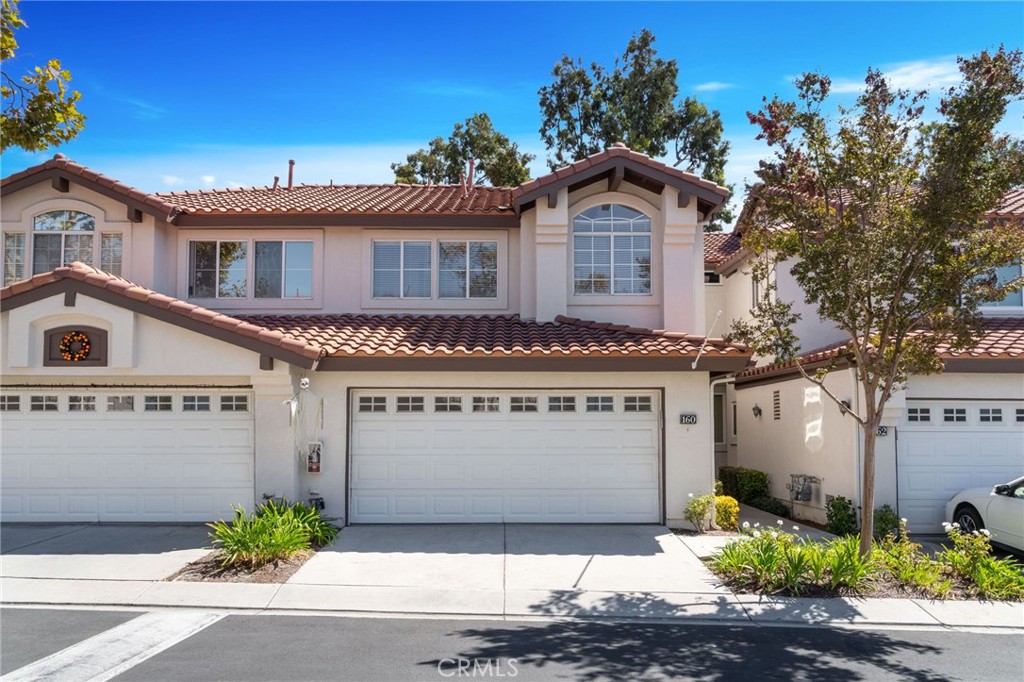 Welcome to your dream home! This beautiful two-story townhome is nestled in Rancho Santa Margarita; a vibrant community rated the safest city in California. 1,644 square foot layout with 3 spacious bedrooms and 2.5 updated bathrooms. Ideal, end of cul-de-sac location, with serene canyon views. The reimagined kitchen has been expanded and opened to adjoining living and dining rooms, enhancing a very comfortable living space. Features include granite counters, updated backsplash, stainless steel appliances (range and refrigerator are new), breakfast nook, and recessed lighting. The spacious dining and living rooms transition seamlessly and feature a cozy two-way fireplace (opposite side is in the breakfast nook). Two large sliding glass windows provide plenty of natural light, and open to a large back patio. The added outdoor space is perfect for larger gatherings (or just enjoying the environment). Upstairs: The large master suite features a sliding glass window (with canyon and sunrise views), balcony, and walk-in closet. The en-suite bathroom includes new garden tub with tile surround (and shampoo niche), new quartz counters, lighting, and plumbing fixtures. The hall bathroom has also been updated with new tub / shower surround, vanity, and plumbing fixtures. The 2nd and 3rd bedrooms provide ample room for queen beds and plenty of closet space. Hard surface flooring throughout, with tile downstairs and attractive luxury vinyl plank floors on the stairs and 2nd floor. In addition to the Candelero pool, your SAMLARC membership includes access to all the city-wide amenities, such as: multiple swimming pools, the Beach Club w/ sand bottom swimming lagoon, basketball, tennis, pickleball, and volleyball courts, clubhouse, parks, and fishing. Other local features: great schools, a skate park, dog park, miles of hiking & biking trails, and the Tijeras Creek golf course. Low property taxes (approximately 1.02%) Welcome to Rancho Santa Margarita, a great place to live!