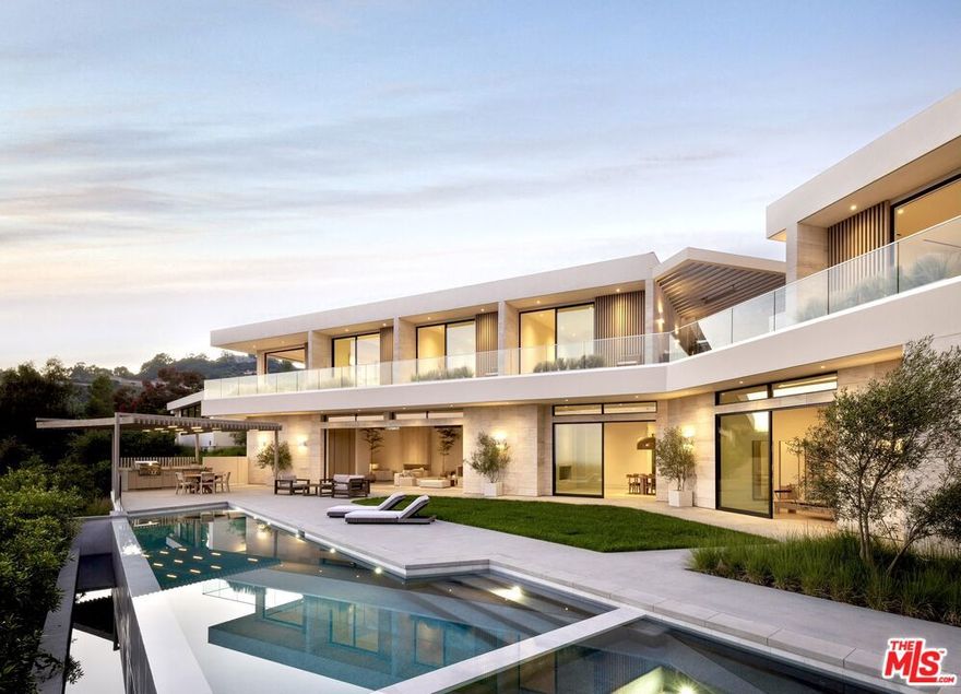 Set masterfully behind private gates, this newly-constructed architectural gem exudes Brentwood luxury living. 1741 Correa Way offers a high end, organically-toned contemporary experience that spans a generous Six-bedroom, Seven-and-a-half bathroom floorplan. This home boasts the best views in Brentwood. Each bedroom provides a large walk-in closet and direct access to either the beautifully-landscaped yard or a private balcony, curating seamless indoor-outdoor living. Nestled on a quiet cul-de-sac street, this house is gated and accessed via a long private driveway. Step inside and experience the true essence of contemporary sophistication and elegance. The warmth of sandblasted travertine and Roman clay walls is complemented by natural oak accents, creating a modern yet inviting atmosphere throughout. The large Fleetwood sliding glass doors in every room allow an abundance of natural light to flood the interiors. The breathtaking ocean views take center stage from all angles. Entertaining is effortless with the amenities this home has to offer. Host lavish gatherings by the infinity pool while taking in the pacific coastline views; delight in movie nights in the state-of-the-art 8-seat theater, complete with a minibar for ultimate indulgence; stay in shape at the fully equipped fitness center; and enjoy outdoor dining in two separate areas or cozy up by the fire pit on cool evenings. The kitchen is a chef's dream, featuring top-of-the-line Miele appliances and sustainable, eco-friendly cabinetry made from 100% clean energy and recycled materials. Every detail has been meticulously thought out to maintain the lowest environmental footprint. Each bedroom upstairs provides a private balcony and magnificent views. The primary suite features two incredibly spacious walk-in closets, fireplace, and a spa-like ensuite bathroom complete with dual sinks, oversized shower with a steamer, a sliding glass door leading to the balcony, and a breathtaking ocean view that can be enjoyed right from the comfort of the bathtub. This light-filled estate embraces the appreciation of warm contemporary architecture, while offering an unparalleled lifestyle experience.
