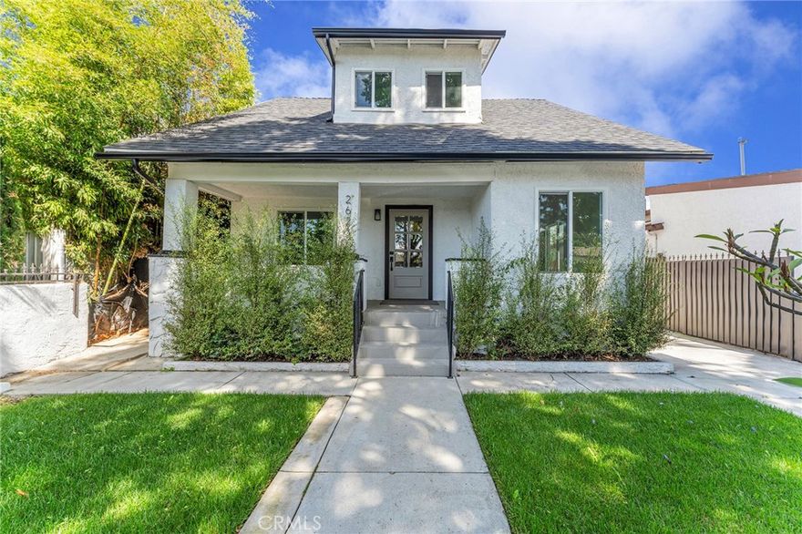 Welcome to this beautifully renovated urban retreat, nestled in the vibrant Mid-City neighborhood of Los Angeles. This spacious home offers four bedrooms and three bathrooms, thoughtfully designed for both comfort and style. Upon entering, you'll be greeted by a unique floor plan that includes a generous living area, well-sized bedrooms, stylish bathrooms, and a modern kitchen. The kitchen features elegant marble countertops, a chic backsplash, sleek white shaker cabinets, and stainless-steel appliances including a stove and dishwasher for added convenience. The interior is tastefully finished with a clean white palette, accented by warm wood tones and modern black fixtures that highlight the home’s charming details. Each bedroom is bright and airy, while the bathrooms are outfitted with contemporary vanities and beautifully tiled bathtub surrounds. Additional features include wood flooring throughout, recessed lighting, mini-split wall units for climate control, and in-unit laundry. The property also includes two separate bonus rooms—perfect for a home office, gym, or creative space. Please note: these bonus rooms are unpermitted and preexisting. A gated fence surrounds the home, providing privacy and security. Ideally located, this property offers quick access to Sofi Stadium, Dodger Stadium, and major freeways like the 10 and 110, making it a prime location for commuters and sports fans alike.