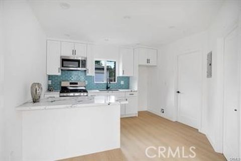 Photo of 11442 Kamloops Pl Pl, Sylmar, CA 91342 (MLS # SR26071160)