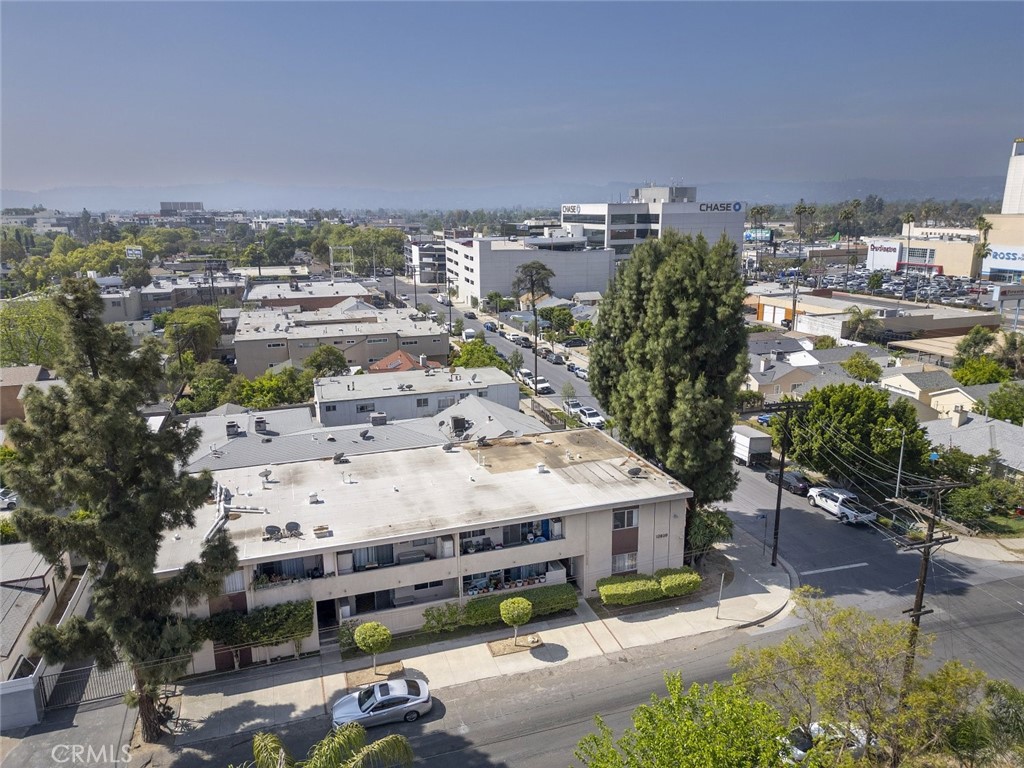 Situated in a highly desirable neighborhood, this well-maintained 7-unit apartment building spans 6,266 sq ft and offers a strong unit mix of (3) 2-bed, 2-bath units and (4) 1-bed, 1-bath units. With excellent frontage on a corner lot and ample curb appeal, this is an ideal opportunity in one of LA’s most sought-after rental markets.
The building features secure gated entry, carport and open parking, and a clean, low-maintenance exterior. Several units offer private patios or balconies, and the layout is designed to optimize privacy and natural light. With significant upside potential in rents, this property presents a value-add opportunity through modernization or strategic tenant turnover.