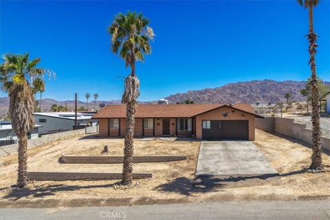 Photo of 73433 Desert Trail DR, 29 Palms, CA 92277 (MLS # JT26121379)