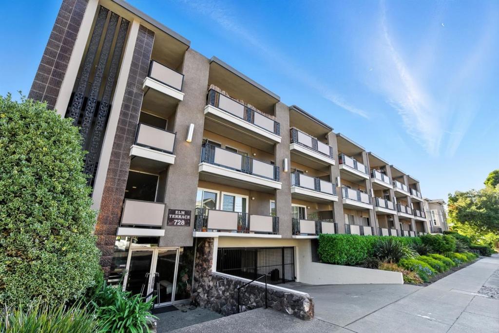 Premier downtown location in the heart of San Carlos, The City of Good Living. Enjoy effortless access to shops, restaurants, the library, senior and youth centers, parks, top-rated schools, the train station, weekly Farmers' Market, and year-round festivals all just steps from your door. This charming end-unit condo offers privacy, natural light, and a thoughtfully designed layout. The kitchen is impeccably maintained and ideal for home chefs, flowing seamlessly into a dining area perfect for entertaining. Relax in the spacious living room or step out onto the generous balcony overlooking the sparkling pool. The primary suite features private balcony access and an en suite bath, while the sizable guest bedroom is served by a conveniently located second bath. A large hall closet provides potential for in-unit laundry. Enjoy beautifully landscaped grounds, a community pool, dedicated parking, and extra storage. Freshly painted with new carpet, this home is move-in ready. A must-see gem in an unbeatable location! Property is virtually staged.