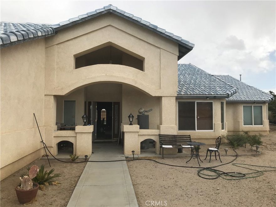 Welcome to this stunning single-story home in the serene community of Pinon Hills, offering the perfect blend of comfort, space, and privacy. With 4 spacious bedrooms, 4 full bathrooms, and nearly 4,000 sq ft of living space, this home is ideal for those seeking room to relax and entertain. Built in 2004 and set on a sprawling 2.4-acre lot, the property boasts endless possibilities—whether you're looking to create your dream outdoor oasis, enjoy peaceful desert views, or simply escape the hustle and bustle. Inside, you’ll find a bright and open layout designed for both functionality and style. Don’t miss this rare opportunity to own a beautiful home with plenty of space, inside and out.
