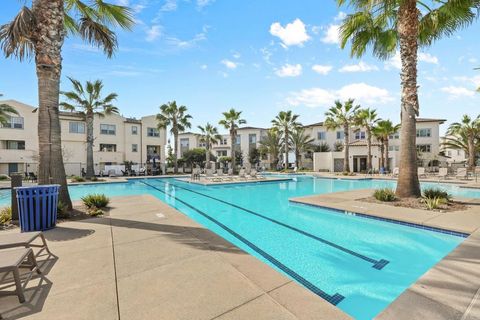 Photo of 5211 Beachfront Cove St. Cv #10, San Diego, CA 92154 (MLS # PTP2601678)