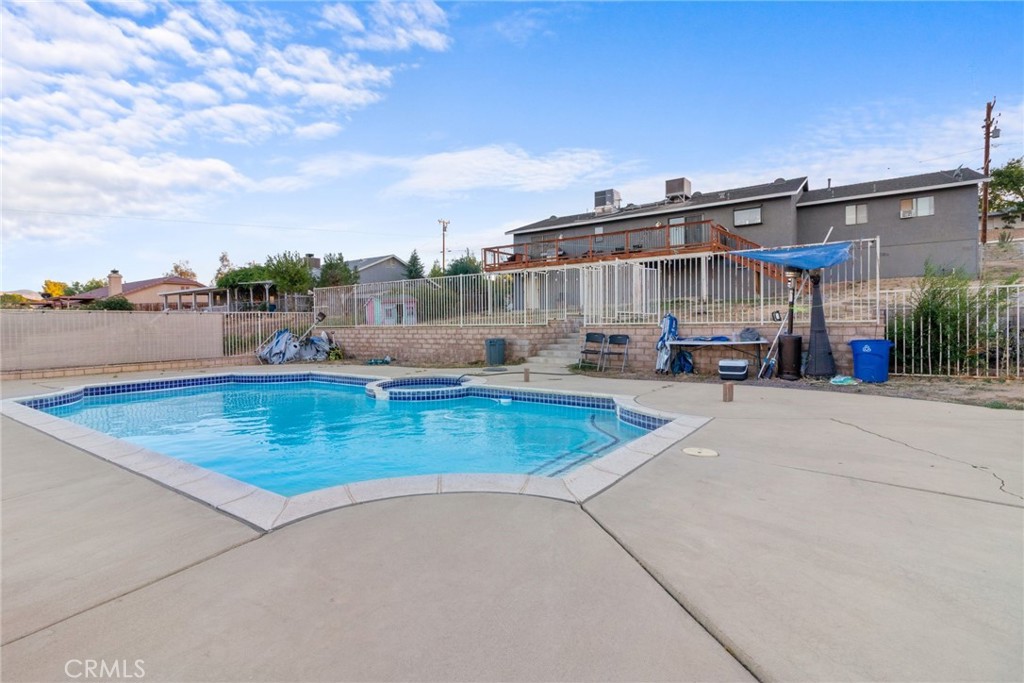 Beautifully updated Hesperia home on a spacious 0.41-acre lot! Features a remodeled kitchen with modern finishes, 4 comfortable bedrooms, and 2 baths. Enjoy your own private pool, perfect for summer days, plus gated RV access and plenty of parking. Located in a quiet neighborhood close to schools, shopping, and major roads. A must-see!