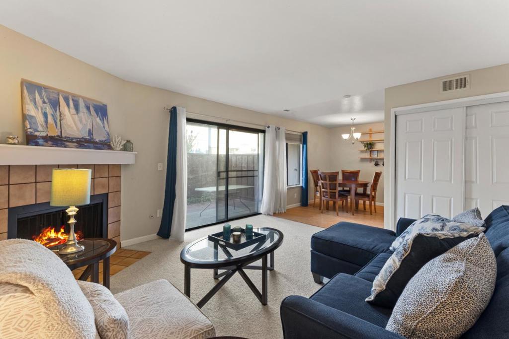 Welcome to 6366 Joaquin Murieta Ave, Unit K in Newark Village! This lower-level condo offers 2 bedrooms, 1 bathroom, and 905 sqft of comfortable living space. The inviting floor plan includes a spacious living room with a cozy fireplace and sliding doors that open to a private patio. In-unit laundry provides everyday convenience, and the kitchen offers plenty of cabinet space for storage. The community features multiple pools, a spa, tennis courts, fitness center, and clubhouse. HOA dues include water, sewer, and garbage. Located in a prime Newark spot, youll have easy access to I-880, shopping centers, Newpark Mall, Costco, Pacific Commons, and a wide variety of restaurants. Only 5 miles from Don Edwards San Francisco Bay National Wildlife Refuge which is located just before Dumbarton Bridge. amazing place for birding and a plethora of outdoor activities.