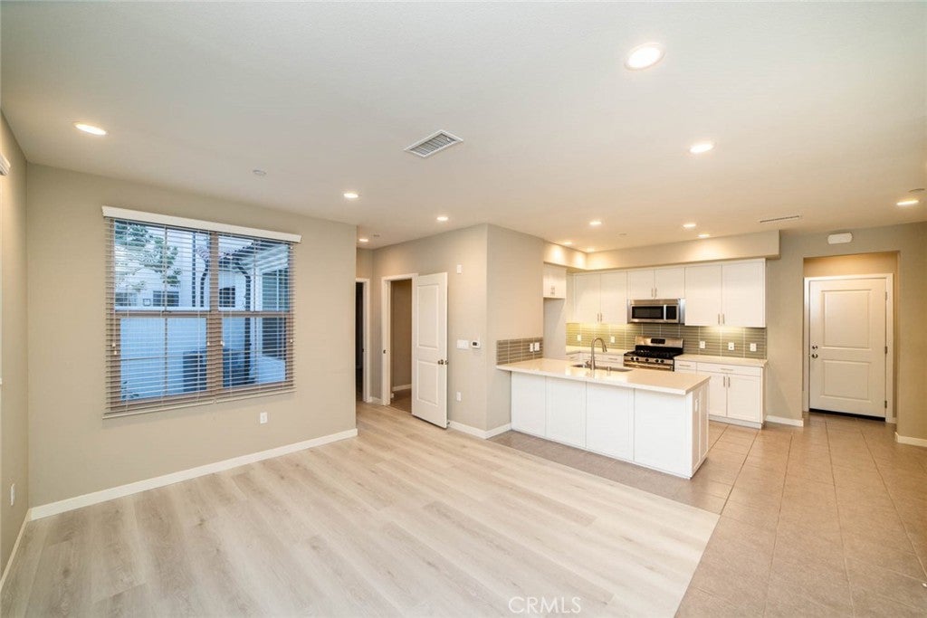 Photo of 128 Tubeflower, Irvine, CA 92618 (MLS # OC26229663)