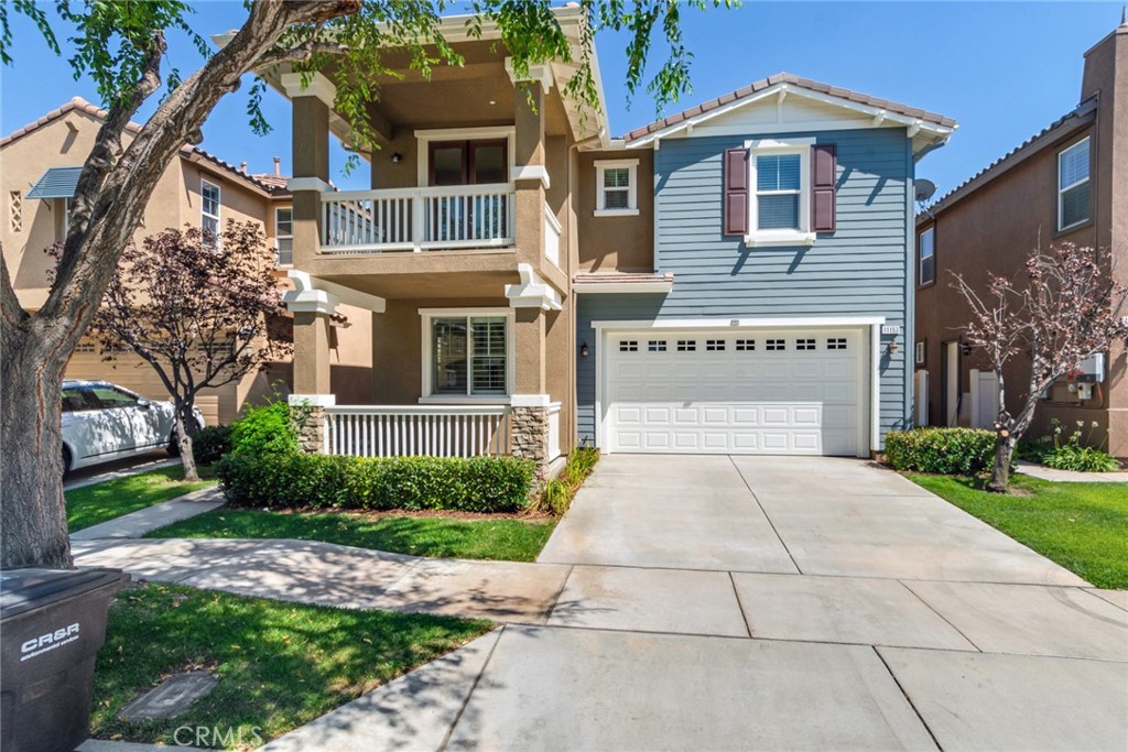Turnkey Home in the Mission Creek Community of Loma Linda. This elegant home boasts 4 bedrooms, 2.75 baths, and a loft. Upgrades to this home includes: Master bedroom with retreat, hardwood floors in the entry and living room, upgraded tiles in kitchen and bathrooms, upgraded designer cabinets in the kitchen with granite counter tops and full backsplash, stainless steel appliances, plantation shutters and blinds, upgraded doors and fixtures, porch in front of house and balcony above, and one of the few homes with rain gutters!!!! Front yard is taken care of by the HOA!!!