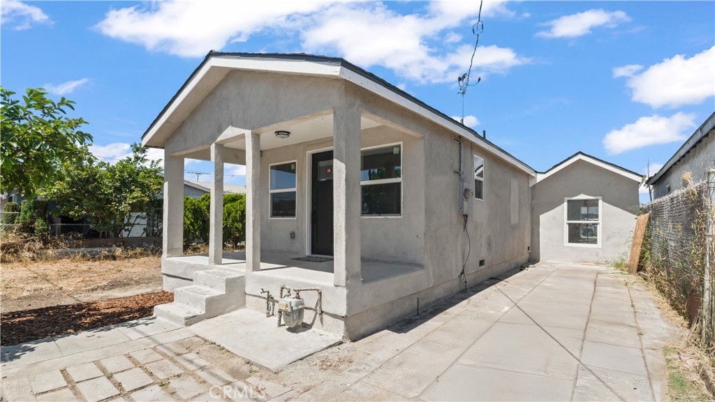 Beautiful and charming 2bedroom 2bath property. This property has been recently remodeled: new kitchen, new floors, new counter tops, new bathrooms, new paint, new split system/ac unit, new fixtures, new window, new bathrooms, new electrical and plumbing, newer roof, and so much more. Don't let the square footage fool you, this property is more than "cozy." Property has a great layout and large backyard area for future growth and or backyard entertainment. Also, property is situated in a quiet clean street with minimal neighbors, and it's located near hospital, transportation, shopping centers and schools. Don't settle for a condo/town house, buy this single-family residence! This HOUSE is ready to be your HOME.