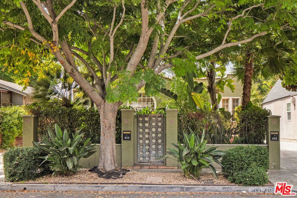 Welcome to this single-story Spanish gem offering both character and comfort in the heart of West Hollywood. Featuring two spacious bedrooms and an updated kitchen that flows seamlessly into a private back patio, a spacious living and dining room. The gated front yard is lush with beautiful landscaping, creating a serene first impression. Convenient driveway parking is located directly next to your entrance for easy access. Inside, enjoy the bright and inviting layout, with timeless Spanish touches complemented by modern updates. This is the front unit of a duplex but it is detached and feels like a single family. Nestled just around the corner from local favorites like Great White and Zinque on Melrose, you'll be steps away from some of LA's best dining and coffee spots while still enjoying the quiet charm of a residential neighborhood.