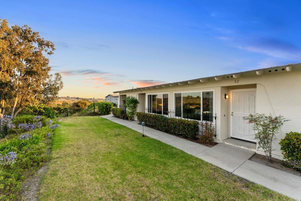Enjoy beautiful views and stylish upgrades in this remodeled 2-bedroom, 1.5-bath home in the sought-after 55+ community of Oceana! This move-in-ready gem features an open and airy layout, complete with a modern kitchen and updated bathrooms showcasing sleek finishes and contemporary touches. New flooring flows throughout the home, adding warmth and elegance. Take advantage of indoor-outdoor living from your private courtyard patio——perfect for relaxing or entertaining—which leads directly to a covered carport. You’ll also enjoy the convenience of a 1-car garage with washer/dryer hookups. Located adjacent to the Emerald Isle Golf Course, Oceana offers fantastic amenities including pools, a clubhouse, and more. Don’t miss this opportunity to live in one of Oceanside’s premier active adult communities!