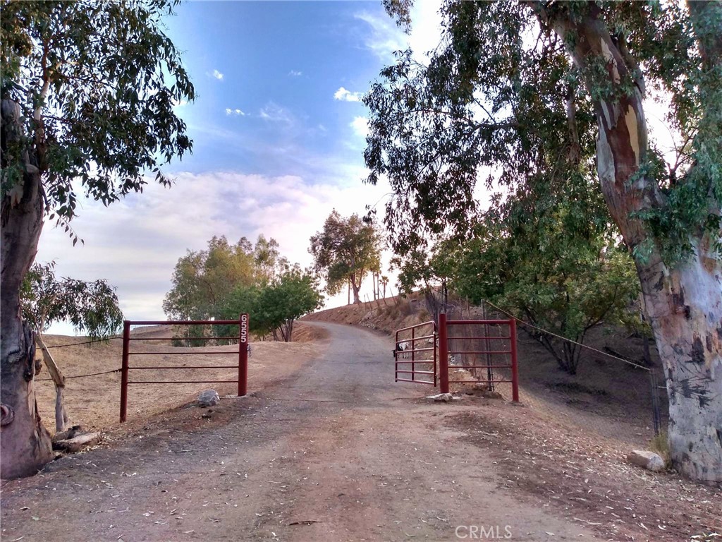 Ready to build!! Trailer and storage containers on site! Enjoy complete privacy and breathtaking 360-degree views on this stunning 15.8 acre parcel. Looking for storage, parking or to build a custom home? This beautiful parcel has endless opportunities! Bordered by California Forestry and San Bernardino County-owned land, this parcel offers unmatched seclusion and unobstructed views. Experience beautiful sunrise and sunsets, serenity and nature at your doorstep at this hill top oasis. This parcel is truly one of a kind. Located in close proximity to the 215 fwy, 210 fwy, 15 fwy, shopping, dining, hiking trails, paragliding & hang-gliding, Cal State San Bernardino, Murillo Family observatory and much more. Zoned RL, water connected on site, electricity available on site, paved road access and low taxes. Opportunity to build multiple homes on site (approx 3 homes per acre). Multiple Flat land areas as well a gentle rolling hills. Video virtual tour is attached to this listing.