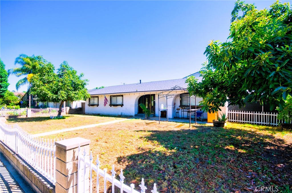 Welcome to 2302 8th St in beautiful La Verne, CA 91750. This exceptional estate is a versatile sanctuary, perfect for multi-generational living or those seeking expansive auxiliary space. The property boasts a generous 2,945 square feet of living area on an 8,183 square foot lot, and is thoughtfully designed to offer privacy and independence with private entries for each unit.
Unit A: Primary Residence - Experience the warmth of home in this 1,563 square foot, 3-bedroom, 2-bathroom haven. Enjoy family meals in the well-appointed gallery kitchen and relax by the cozy fireplace in the living room. The master suite offers a luxurious escape with its jacuzzi tub.
Main ADU - This impressive two-story, 3-bedroom, 1-bathroom Auxiliary Dwelling Unit is ideal for in-laws, adult children, or long-term guests. It features a full kitchen, dedicated laundry area, and private entry.
Junior ADU - Discover a charming studio unit complete with its own kitchen, bath, and private entrance, perfect for guests or as a personal retreat.
Additional amenities include a detached 2-car garage and a sprawling driveway accommodating up to six vehicles. All easily accessible via a convenient alley.
Situated facing north, offering picturesque views of the Foothills and overlooking La Flores Park, this home provides an idyllic setting. Enjoy the convenience of walking distance to local parks and effortless access to major attractions like Raging Waters and Bonelli Recreational Lake (just minutes away). Education is highly accessible, with renowned schools, the University of La Verne, and the prestigious Claremont Colleges all nearby.