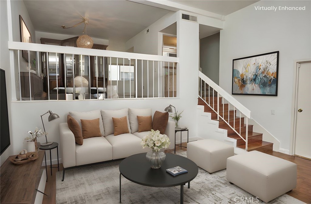 Welcome to Dove Creek—Where Comfort Meets Convenience. Step into this light-filled 3-bedroom, 2.5 bath townhouse offering over 1,750 sq ft of airy living space with soaring ceilings and an open layout designed for modern living. The primary suite features a private ensuite bathroom, while the flexible third bedroom loft includes a built-in desk and storage—ideal for a home office, guest room, or creative retreat. Enjoy seamless indoor-outdoor living with sliding glass doors opening to your own private courtyard. The spacious kitchen boasts ample cabinetry, an entertainer's wet bar, and flows into a freshly painted interior. The attached 2-car garage includes dedicated laundry space for added functionality. Dove Creek offers resort-style amenities including a heated pool, two hot tubs, two tennis courts, and meticulously landscaped grounds—all set in a serene, well-maintained community. Located minutes from The Village, Westfield Topanga, Woodland Hills Recreation Center and the 101 freeway, this home places shopping, dining, and nature right at your fingertips. Schedule your private tour today.