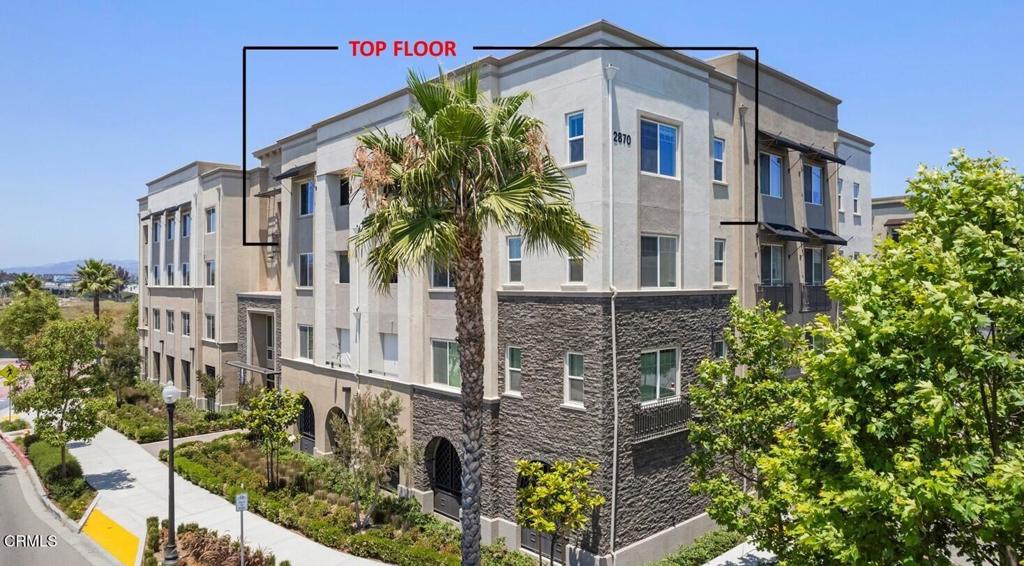 Rare, top-floor luxury 2 bedroom condo in Oxford Flats with south-facing views in the desirable Wagon Wheel Community. Don't miss this exceptional opportunity to own a single-story penthouse condo offering 1,789 sq. ft. of beautifully designed living space, featuring 2 bedrooms, 2 bathrooms, an outdoor California Room, and thoughtful details throughout. Ideally located in within the development, this home offers tranquil south-facing views to enjoy ocean breezes, stunning sunsets, and a peaceful overlook of Wagon Wheel Road, the community park, and square--away from the noise of the freeway. This light-filled residence boasts expansive windows, 9' tall ceilings, and an open concept floor plan. Enjoy indoor-outdoor living with the California room--a spacious, partially enclosed patio featuring upgraded tile flooring, perfect for entertaining or relaxing in the fresh air. The chef's kitchen is a highlight, featuring a large center island, stainless steel appliances, quartz countertops, white shaker-style cabinetry, under cabinet lighting, upgraded backsplash, stainless steel appliances, and designer light fixtures. The expansive primary suite has two custom-built closet systems and an oversized bathroom with a large tub, dual sinks, and a wide-entry shower. For privacy, the second bedroom is located on the opposite side of the home also with custom-built closet systems, and a full bathroom directly across the hallway. Included as part of the sale, and adding a lot of value, is the fully owned solar powered unit, water softener, water conditioner, and a reverse osmosis system. Designed for modern living, the condo comes equipped with an array of important features including; electronic building access and floor restricted access, efficient central heat and air conditioning, a trash chute in the hallway for convenience, a tankless water heater, and a private storage closet in the common hallway. The gated garage offers two side by side assigned spaces, addiontal guest parking, and access to EV charging stations. The Wagon Wheel community offers an array of amenities for an active lifestyle, including a family friendly park, shaded gazebos, multi-use paths, a playground, picnic areas, BBQ spaces, sand volleyball court. Conveniently located to nearby beaches, freeway access, restaurants and shopping, this location combines luxury living with easy access to surrounding areas. Do not miss this chance to own one of the best two bedrooms in Oxford Flats.