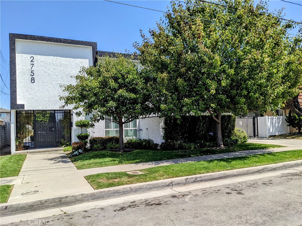 Discover this beautifully upgraded 3-bedroom, 2-bathroom apartment, located in the heart of Old Torrance. Designed with modern, high-end finishes throughout, this upper level unit offers both comfort and style. The kitchen has tile countertops and flooring, with sleek stainless steel appliances including a range, refrigerator, and dishwasher. Wood flooring in the living room and bedrooms. The unit also has easy access to a convenient on-site laundry room for added convenience, as well as a one-carport assigned parking spot.
With a prime location just minutes from Del Amo Mall, charming Old Torrance shops, and the beach, you'll be perfectly positioned to enjoy everything this vibrant community offers. This is a pet-friendly building and service animals welcome. Landlord pays for water and trash, tenants are responsible for all other utilities.