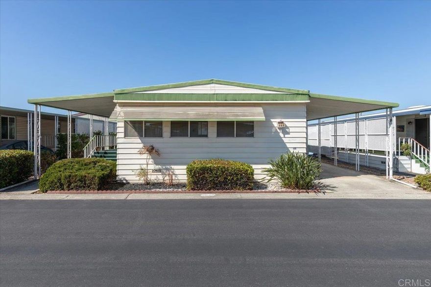 Recently refurbished Vinyl plank flooring throughout upgraded appliances  paint .  Bookcase in the living area adds a great feature for storage and to display cherished keepsakes.  Bright open floorplan lighter wood flooring.  .  This porch has generous outdoor living space.