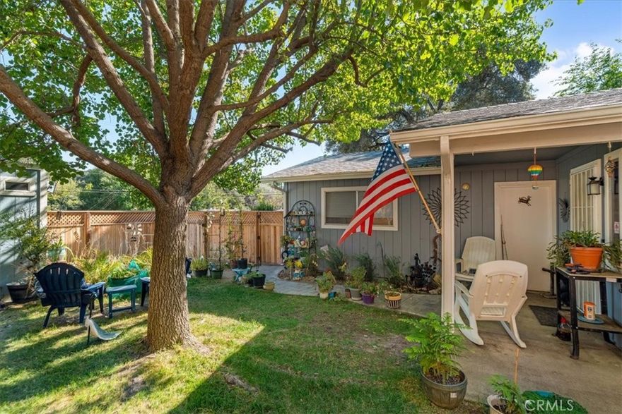 Charming 2 Bedroom, 1 Bath Home with Beautiful Upgrades and Outdoor Oasis.  

Welcome home to this delightful 2-bedroom,1-bath gem featuring a bright, updated kitchen with quartz countertops, a stunning glass tile backsplash, gas range, energy-saving quiet dishwasher and a lovely garden window perfect for your favorite plants. 

Enjoy tile floors throughout for easy maintenance and fresh clean feel.  The guest bedroom includes a convenient Murphy bed, offering flexibility for guests or office space. 

Step through the sliding glass door from one bedroom to your private backyard retreat featuring a pergola, Reinier Cherry Tree and butterfly garden.  The yard is fenced and cross fenced - ideal from pets, entertaining or simply relaxing outdoors.  

The home also features a newer shed, perfect for extra storage or workspace, a double car garage plus extra parking in the driveway for added convenience.