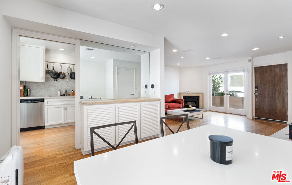 Welcome home to this light-filled beachside townhouse offering the best of coastal Santa Monica living. This 3-bedroom, 2.5-bath home features a private rooftop deck with sweeping views of the city and Santa Monica Mountains, perfect for relaxing or entertaining under the sun. Thoughtfully upgraded with French doors, hardwood floors, and flagstone patios, this home combines charm with modern convenience. The open layout includes central A/C and heat, in-unit laundry, and a private two-car garage with direct access. Enjoy four private outdoor spaces, including a spa-like primary bathroom with a soaking tub. Located on a quiet, tree-lined street in the desirable Santa Monica-Malibu Unified School District(Roosevelt Elementary, Lincoln Middle, and Santa Monica High). Steps from Montana Avenue, the 3rd Street Promenade, Palisades Park, the Pier, and the beach, this is coastal living at its finest. With low HOA dues and an unbeatable location, this is the coastal breezy lifestyle you've been waiting for.